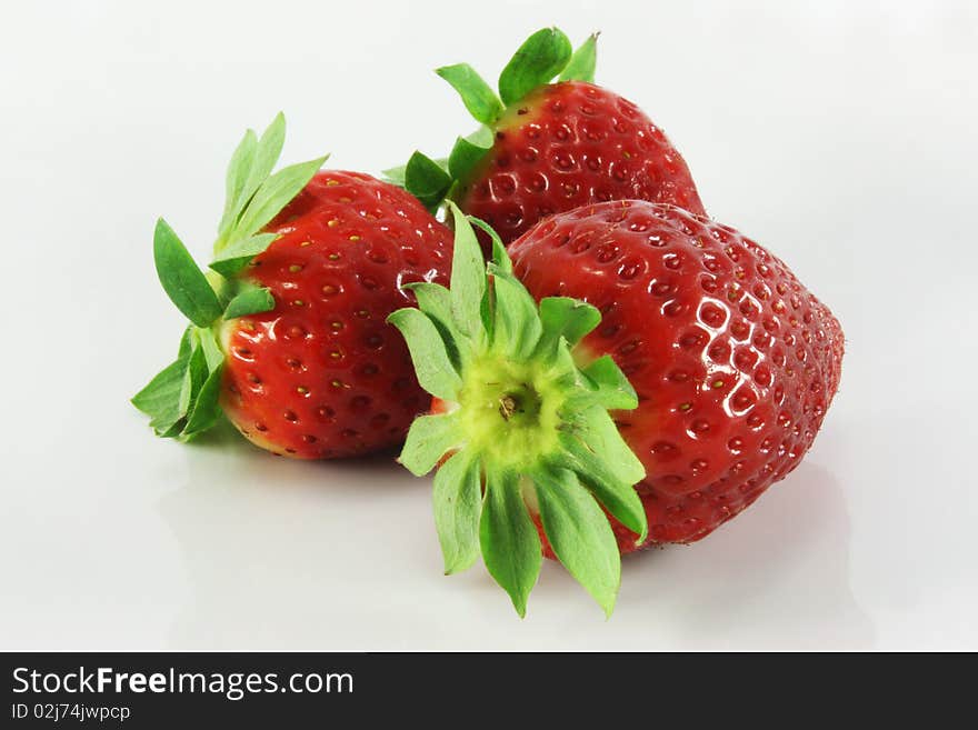 Three strawberry on white background