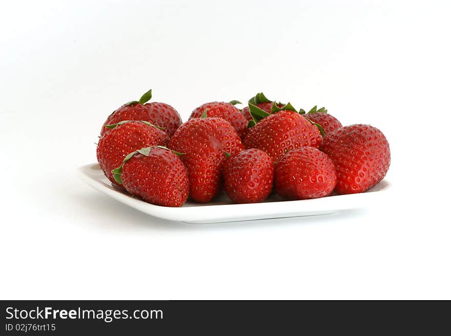 Most natural red strawberries, still life, isolated over white background