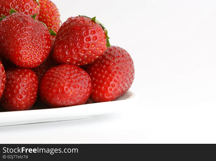 Most natural red strawberries, still life, isolated over white background