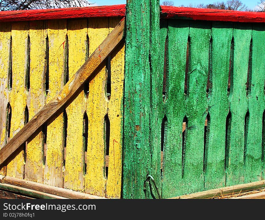 A colorful Russian fence in drab Siberia. A colorful Russian fence in drab Siberia