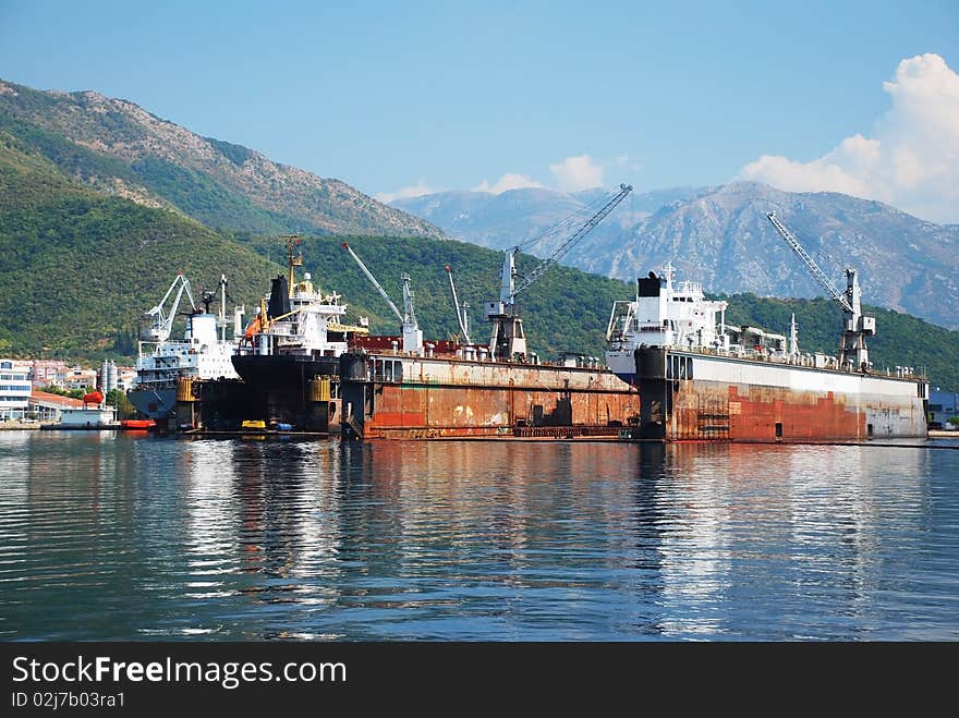 Shipyard on the coast with industrial ships