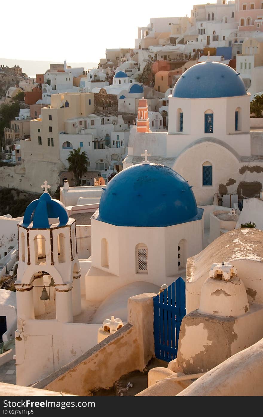 Greek church in santorini greece with a cross