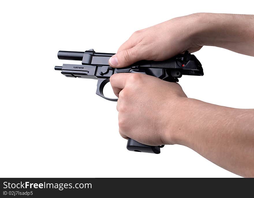 Gun in hand on a white background