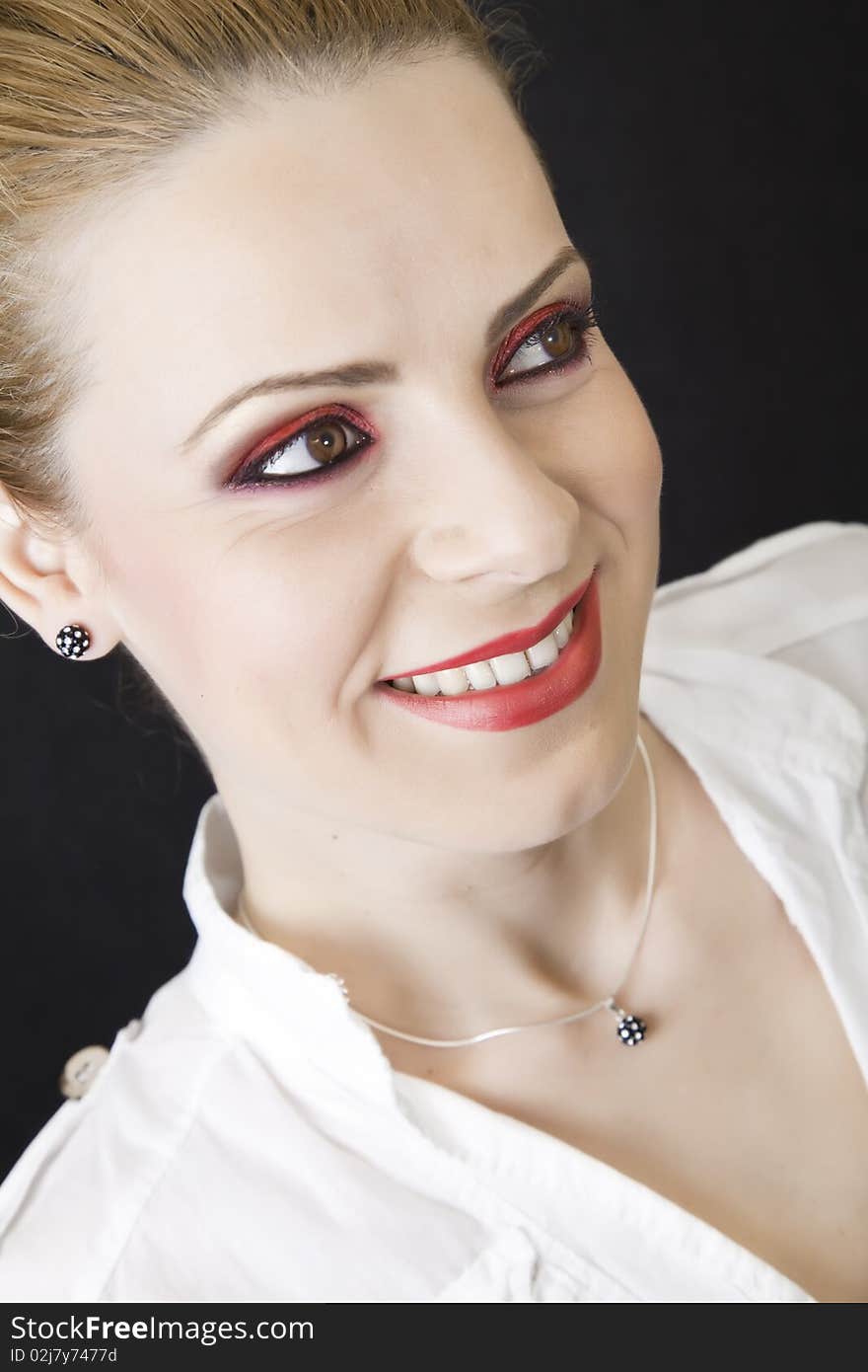 Female portrait with a red makeup