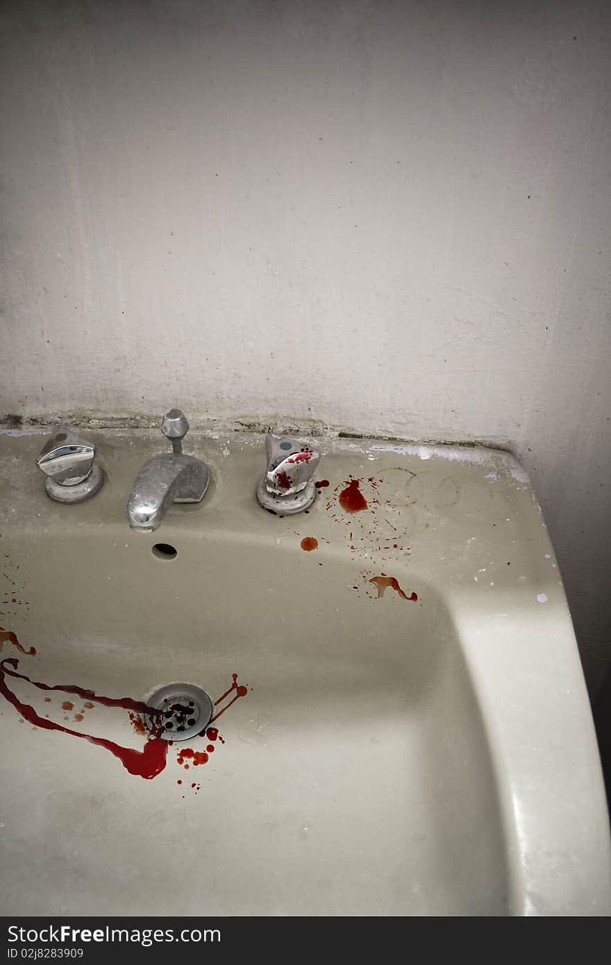 Splashes of blood in a sink