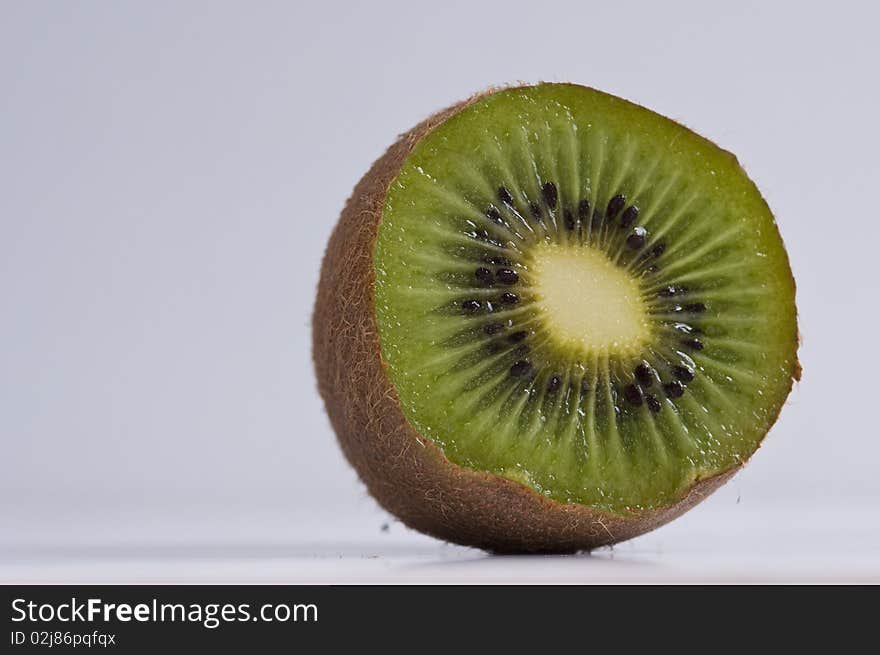 Sliced kiwi on white background