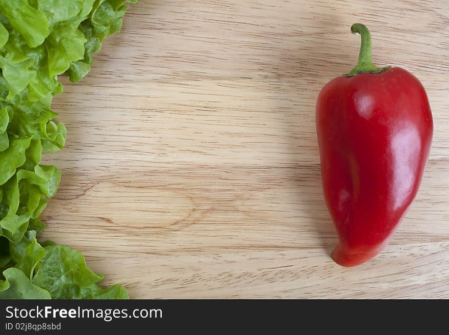 Fresh bell pepper on wooden board with space for text. Fresh bell pepper on wooden board with space for text