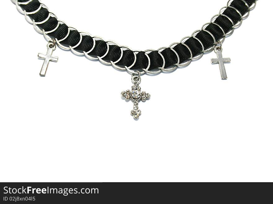 Necklace with crosses isolated on white background.