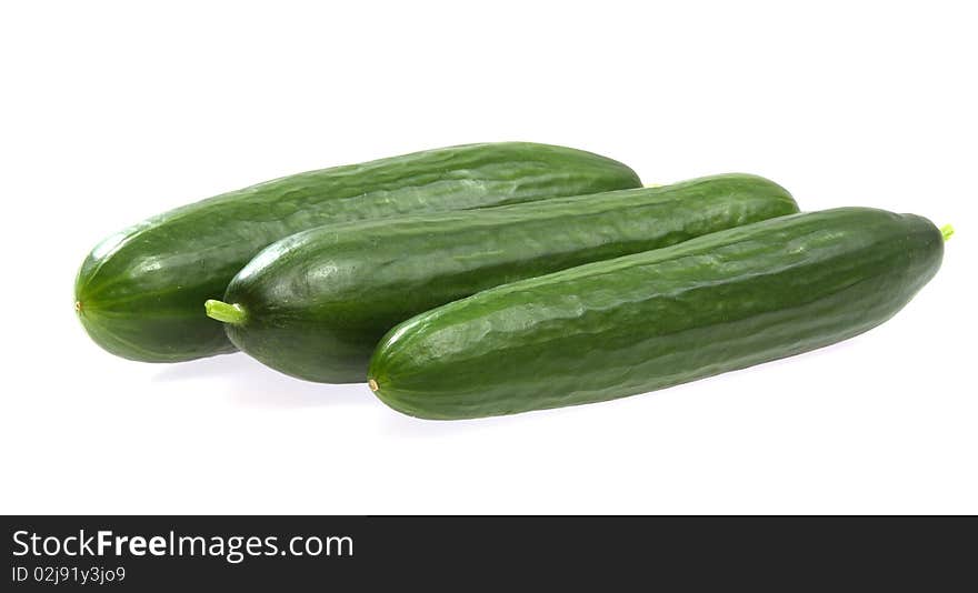 Fresh cucumbers on white background close up shoot