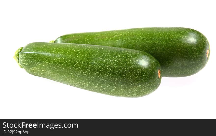 Fresh vegetable - zucchinis isolated on white background