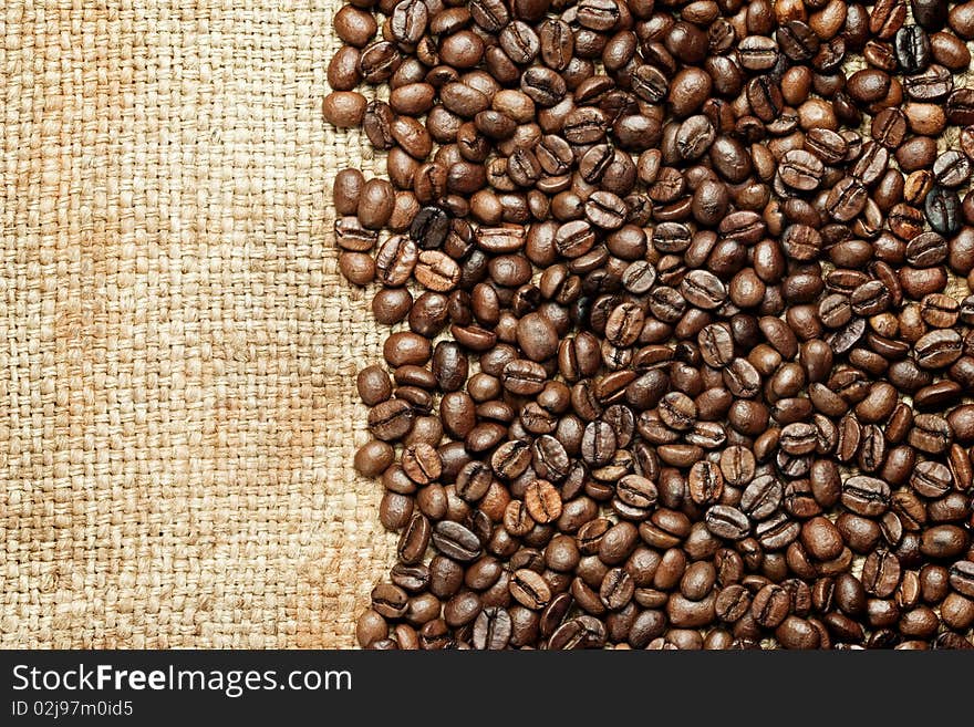 Fresh roasted coffee beans background. Fresh roasted coffee beans background