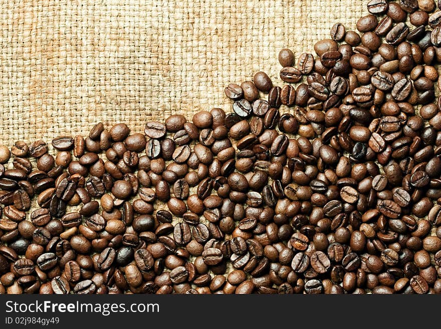 Fresh roasted coffee beans background. Fresh roasted coffee beans background