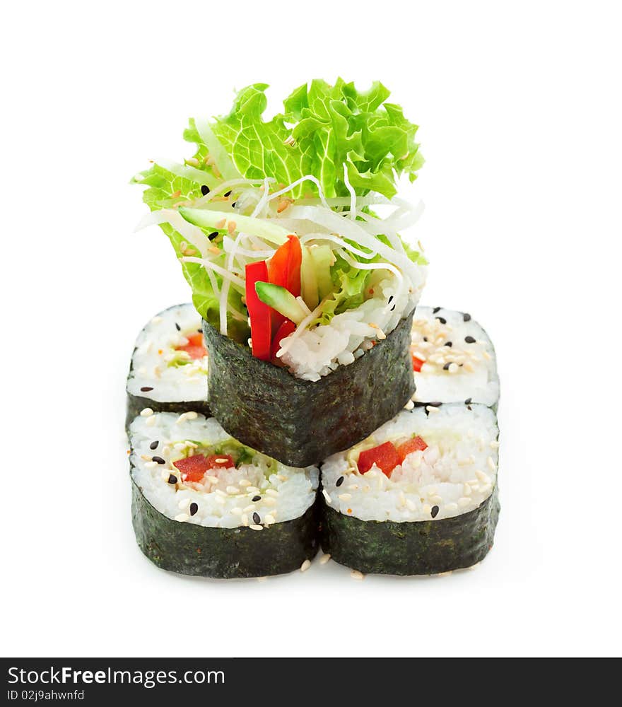 Vegetarian Maki Sushi - Roll made of Cucumber, Bell Pepper, Salad Leaf and Daikon (white radish). Vegetarian Maki Sushi - Roll made of Cucumber, Bell Pepper, Salad Leaf and Daikon (white radish)