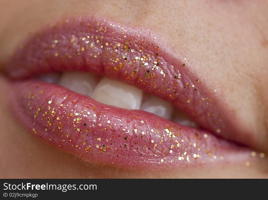 Close up view of some red lips smiling. Close up view of some red lips smiling.