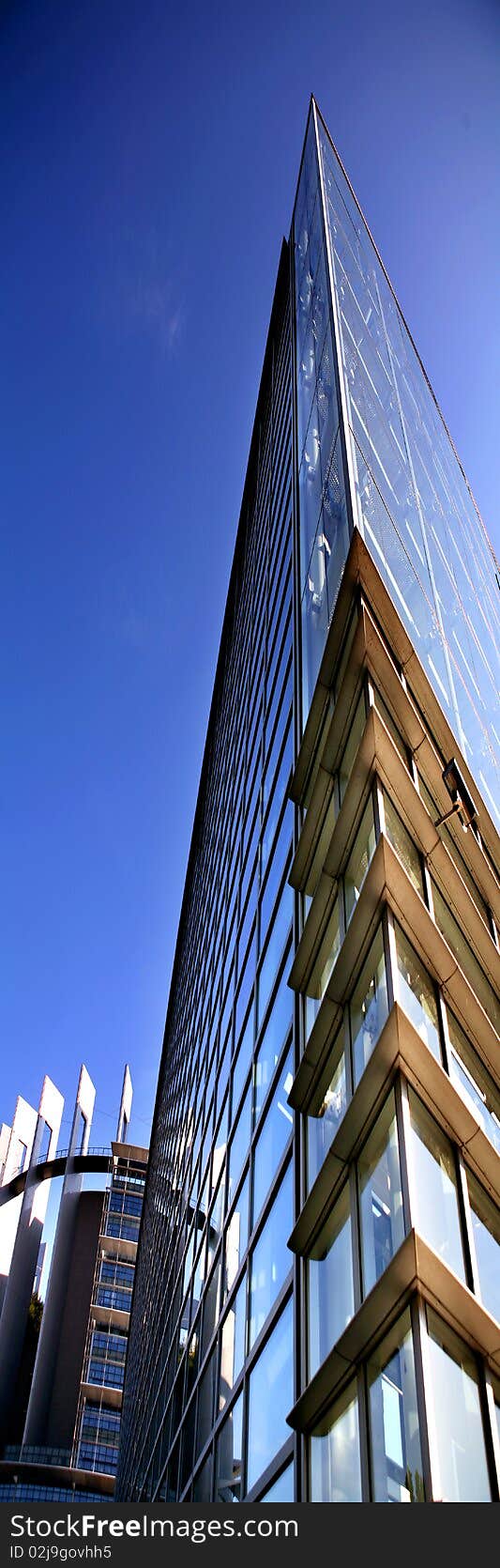 Modern architecture of a glass building with corner