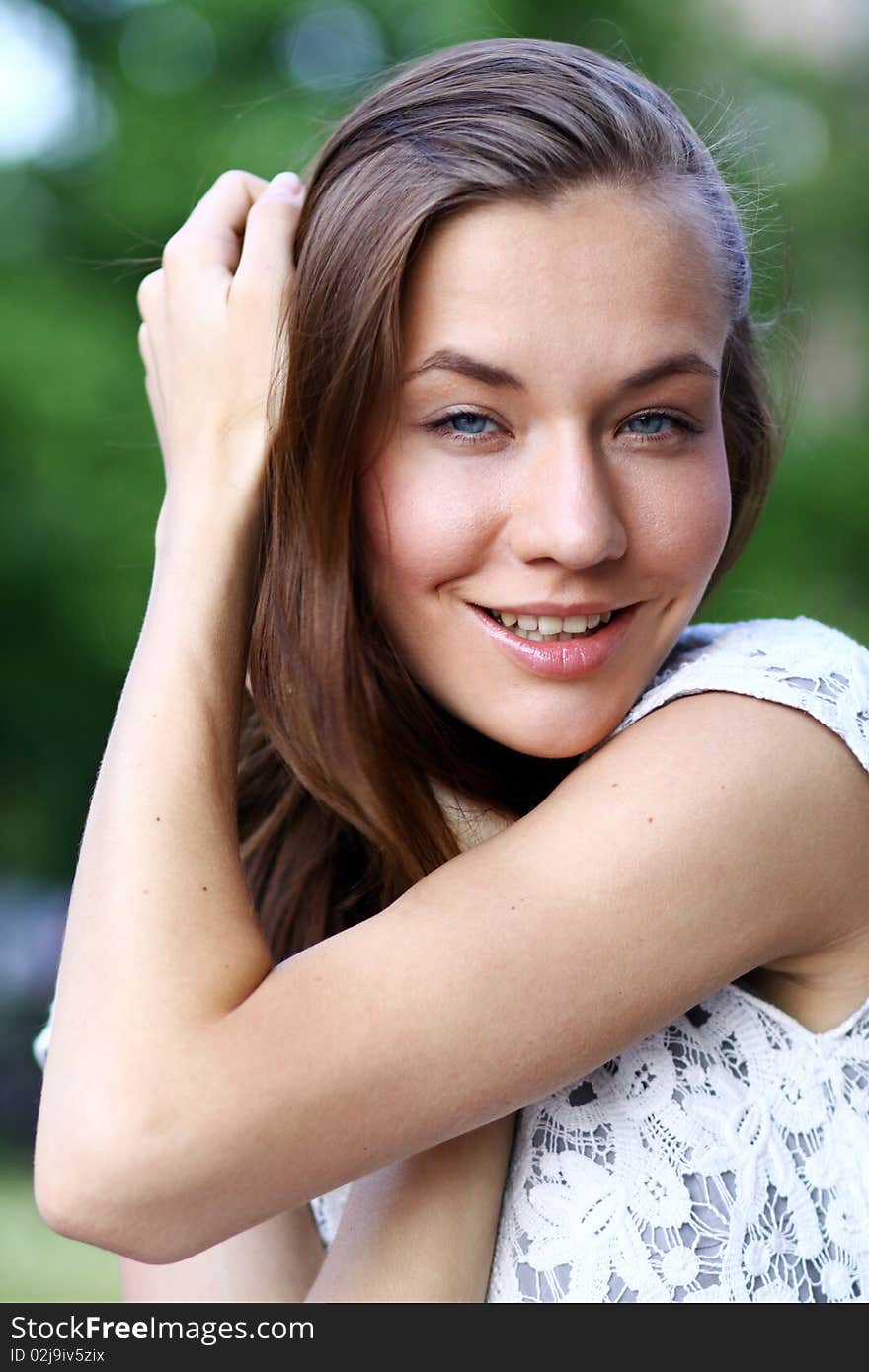 Closeup portrait of a happy young woman smiling