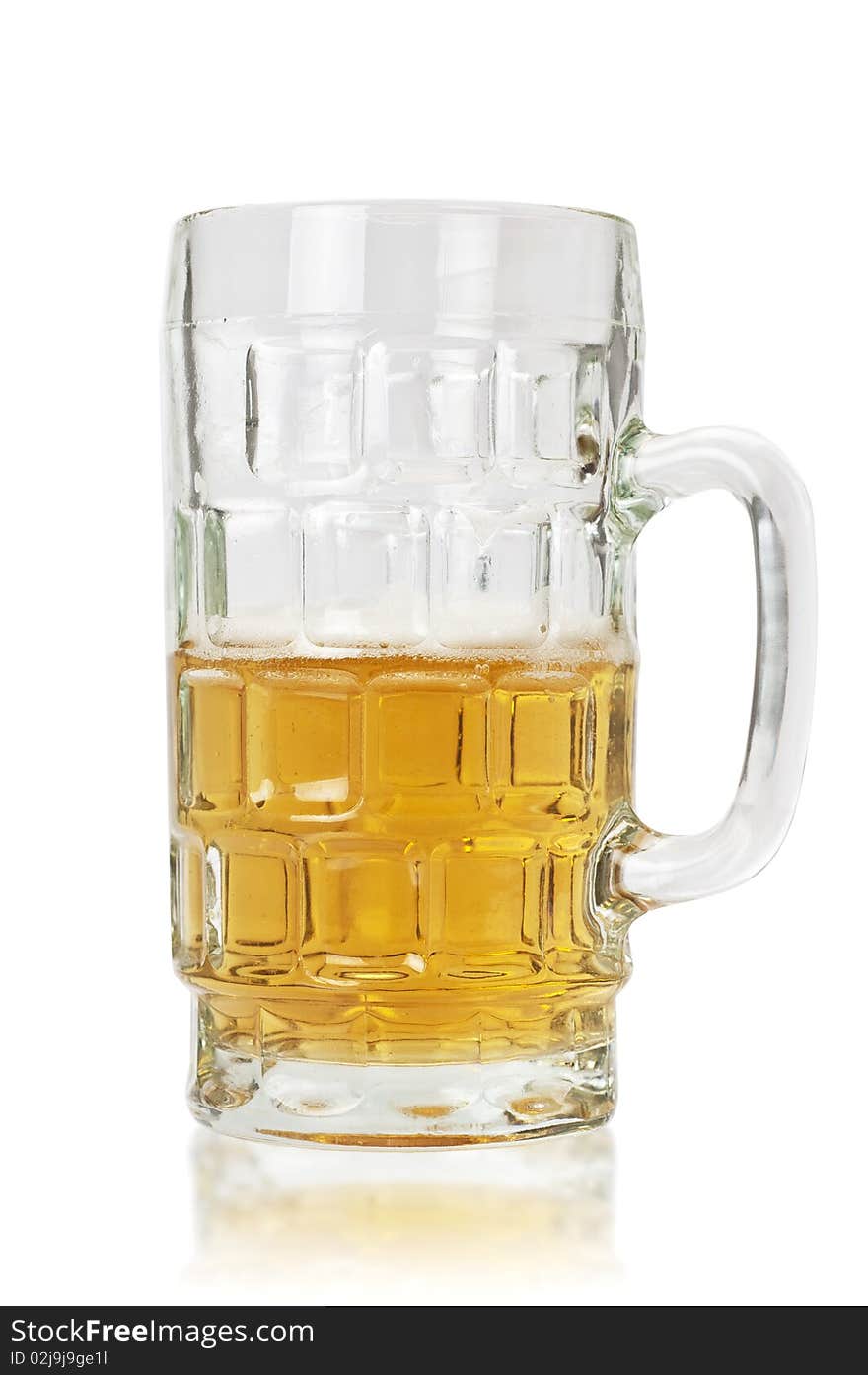 A mug of beer half empty (clipping path included). A mug of beer half empty (clipping path included)