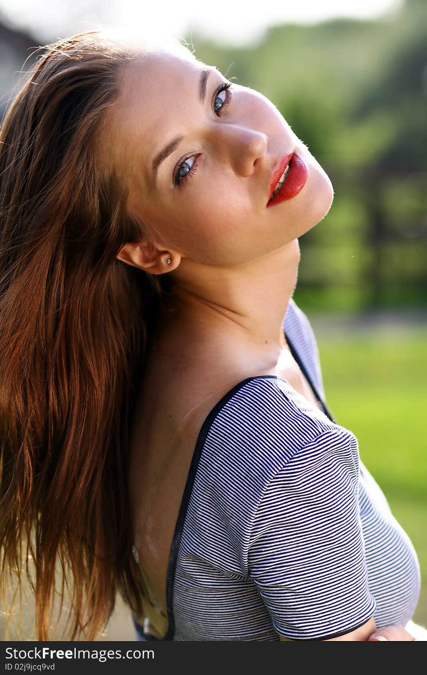 Closeup portrait of a happy young woman smiling