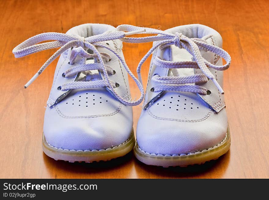 White baby shoes