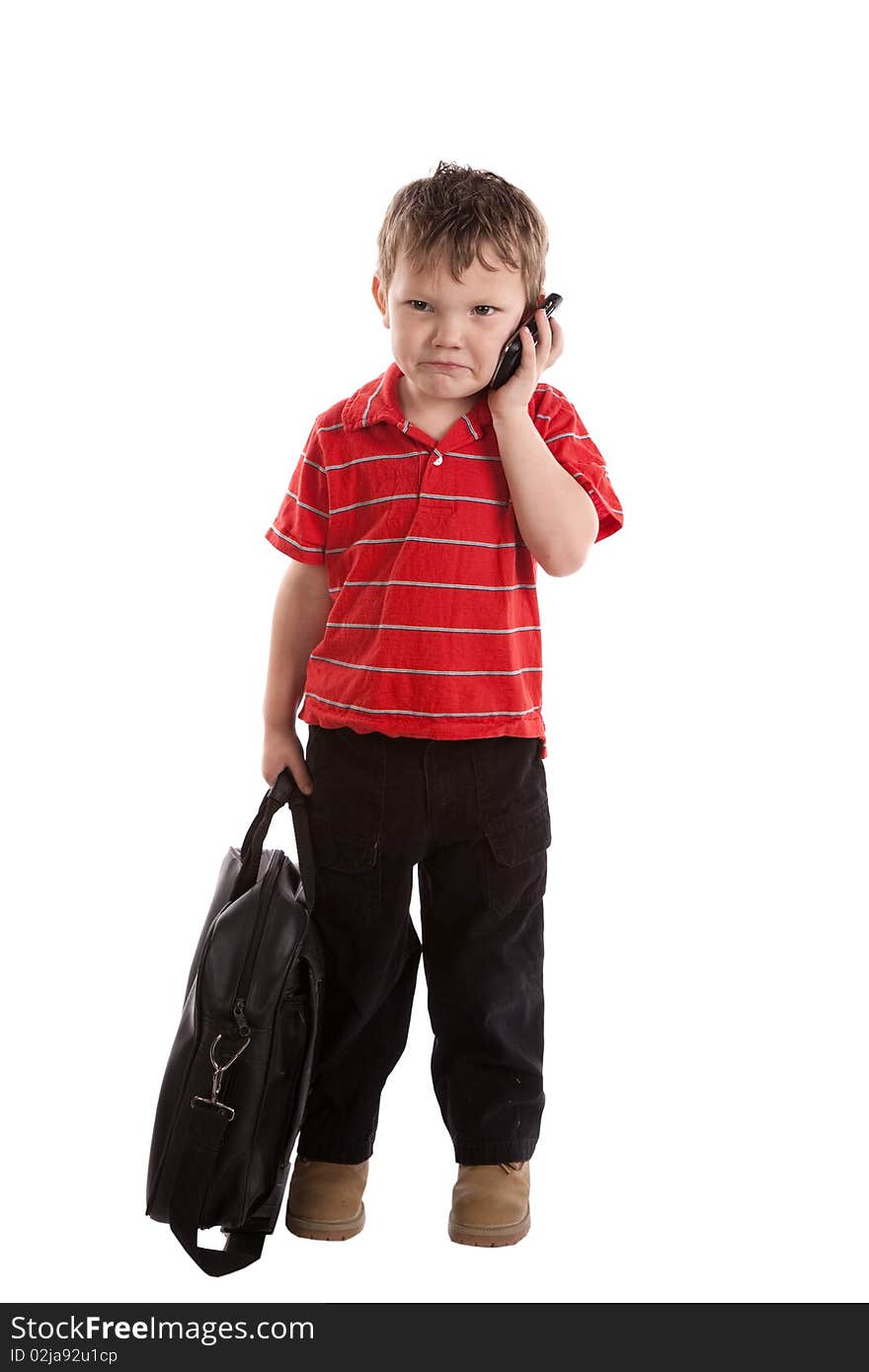 A very young boy has a black bag is is frustrated and. A very young boy has a black bag is is frustrated and