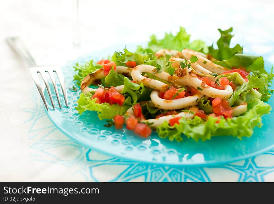 Grilled calamari with tomato and red bell pepper salsa