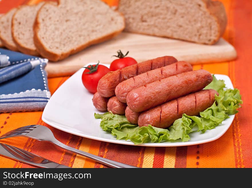 A Plate with hot sausages