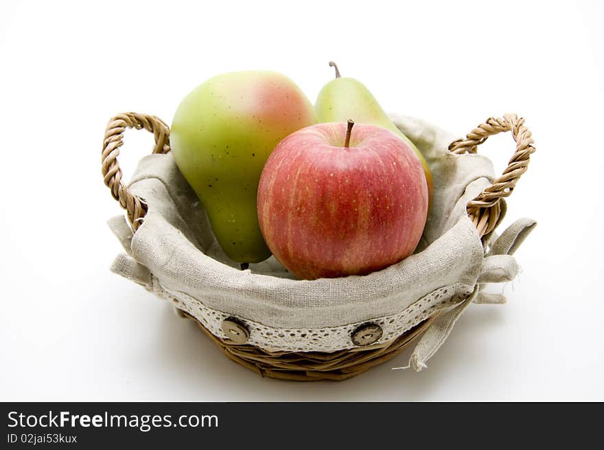 Apple and pears in the basket. Apple and pears in the basket