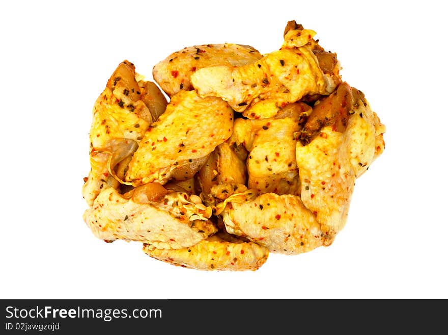 Delicious healthy fresh raw barbecue chicken wings ready to prepare on a plate isolated on white background