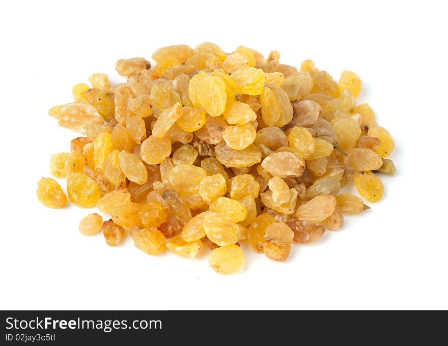 Yellow raisins isolated on white background