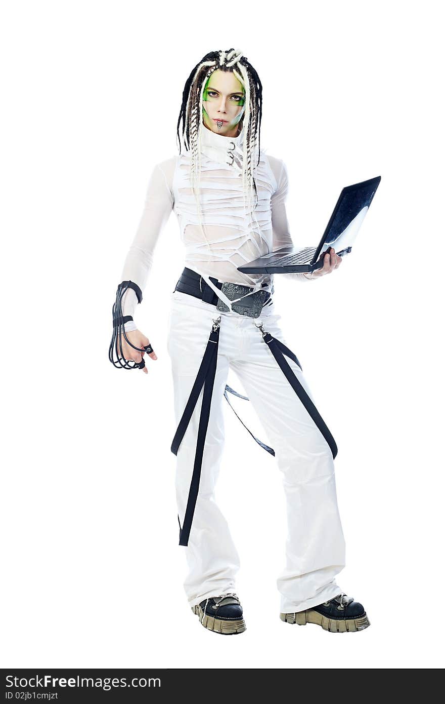 Shot of a futuristic young man with wires holding a laptop. Isolated over white background. Shot of a futuristic young man with wires holding a laptop. Isolated over white background.