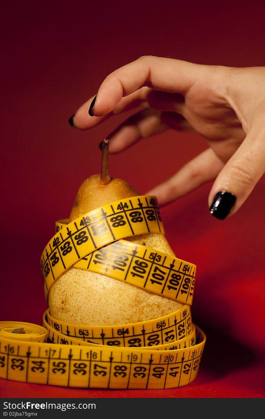 Pear with measuring tape