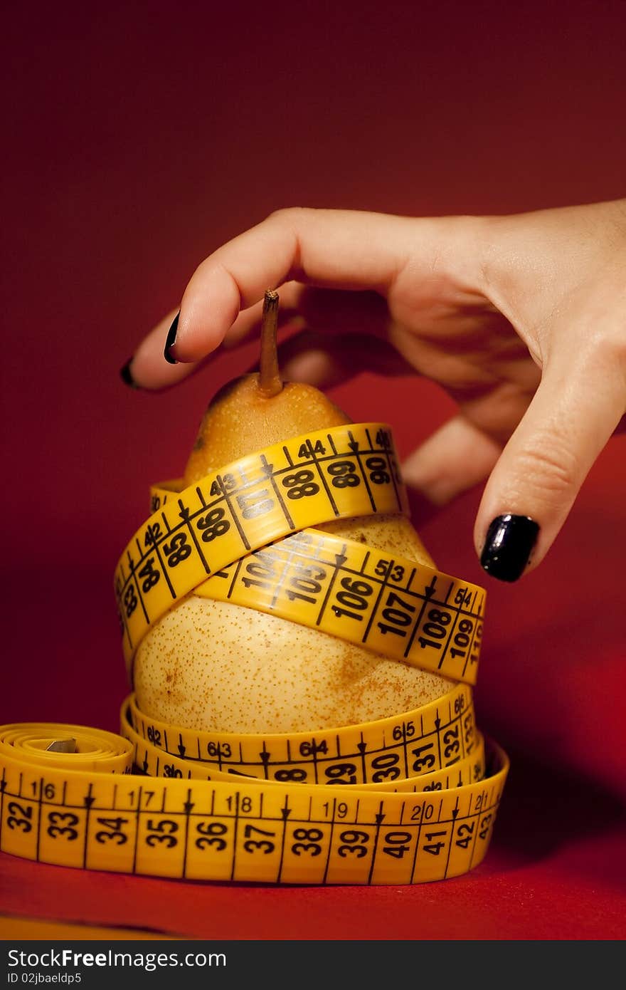 Pear with measuring tape