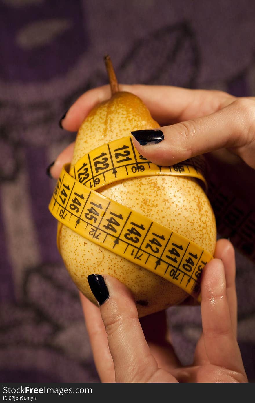 Pear with measuring tape