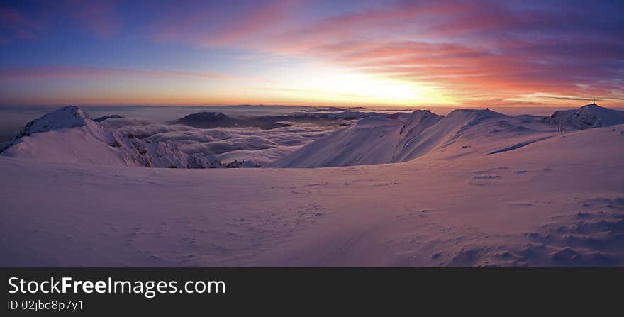 Almost impossible time to stand still. -23degree Celsius and over 100km/hour wind in Bucegi Mountains, Carpathians, Romania. Almost impossible time to stand still. -23degree Celsius and over 100km/hour wind in Bucegi Mountains, Carpathians, Romania