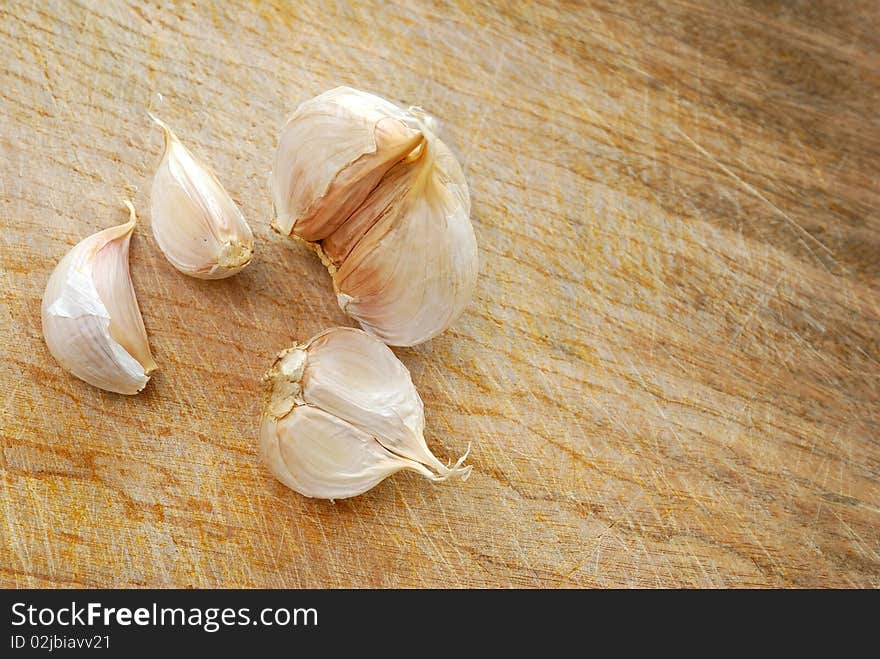 Fresh garlic on chopping board