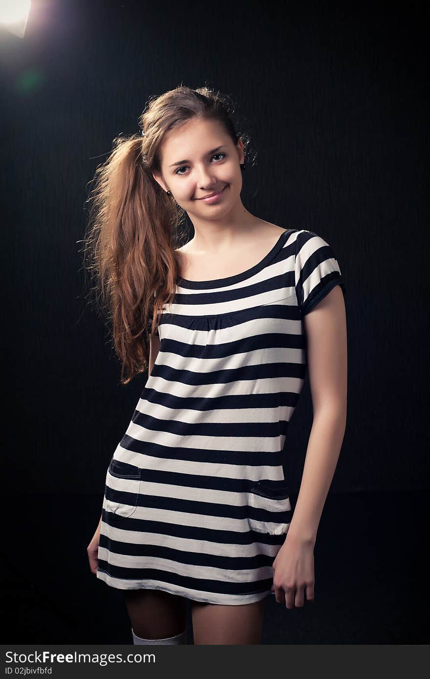 Beautiful young girl in studio