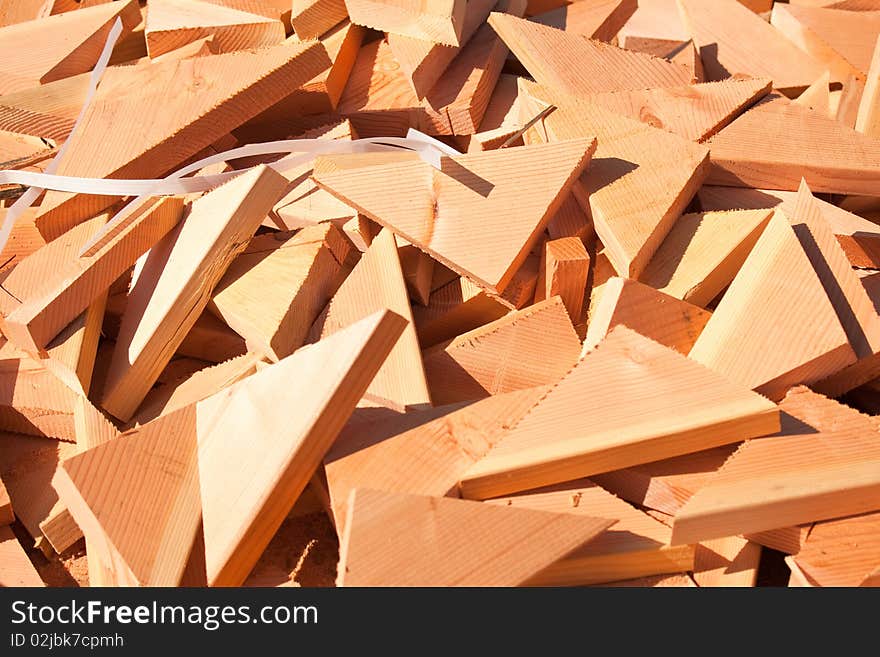 Pile of Building Lumber Scraps at Construction Site.