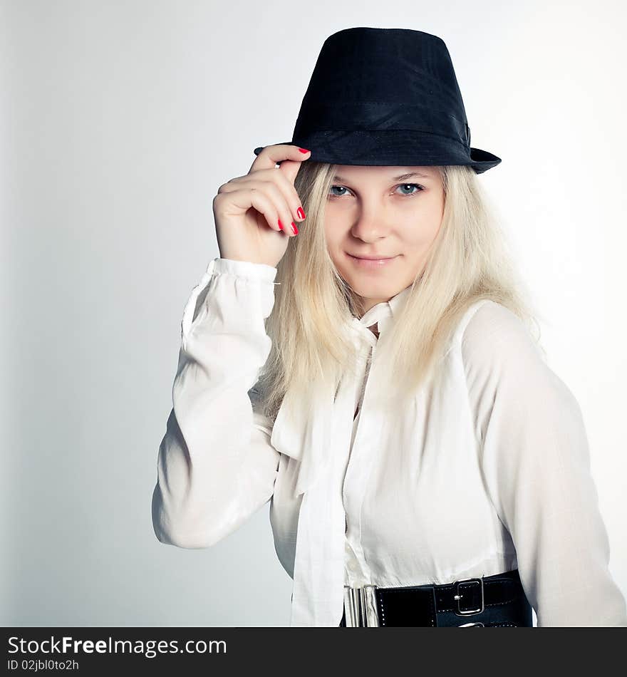 Young beautiful girl in hat