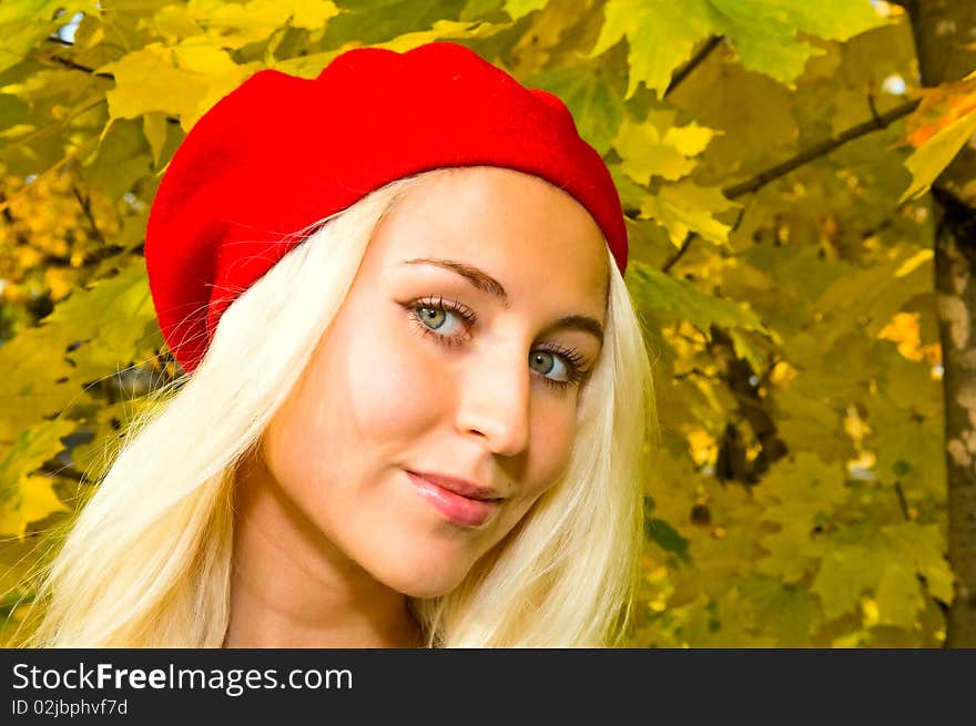 Blonde Girl In Red Cap