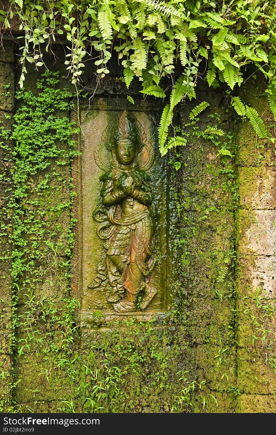 Apsara sculpture on the wall