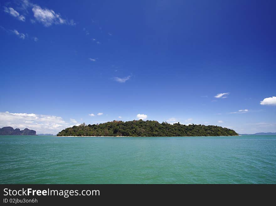 The beautiful island with the blue sky and turquoise sea