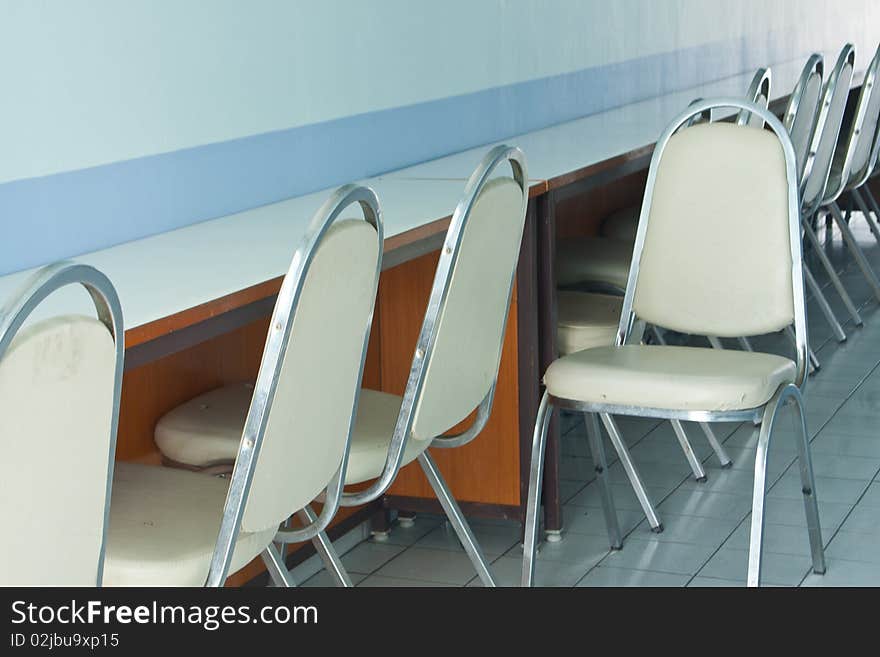 Chairs and the table in the room