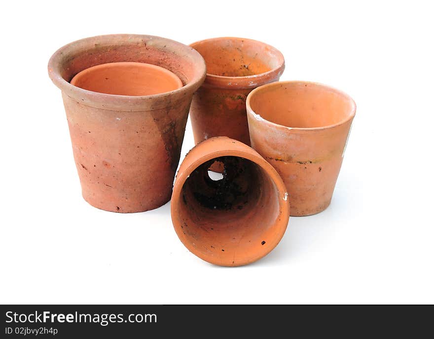 Shot of some terracotta pots on white