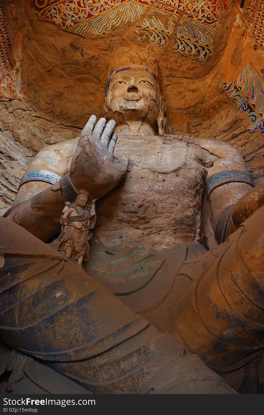 The colorful statue of Buddha of North Wei period is taken to Shanxi, China province, embodied the ancients superb craft.