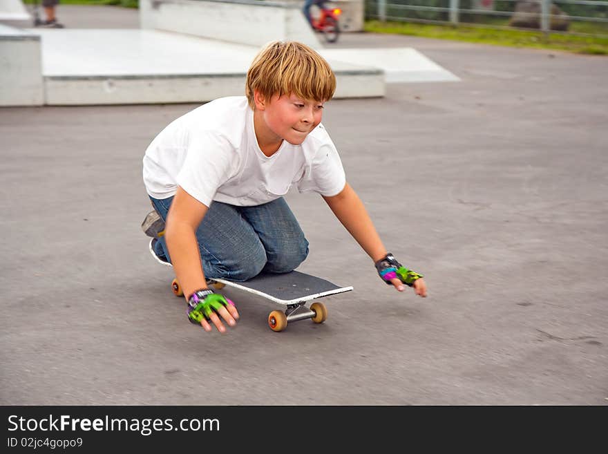 Boy riding skate board