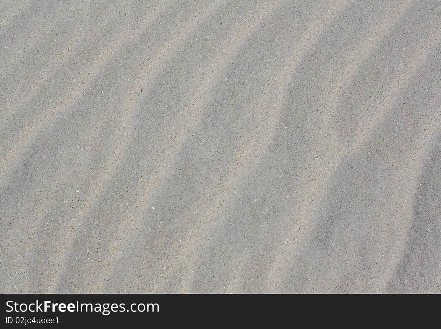 Wave on a very fine sand