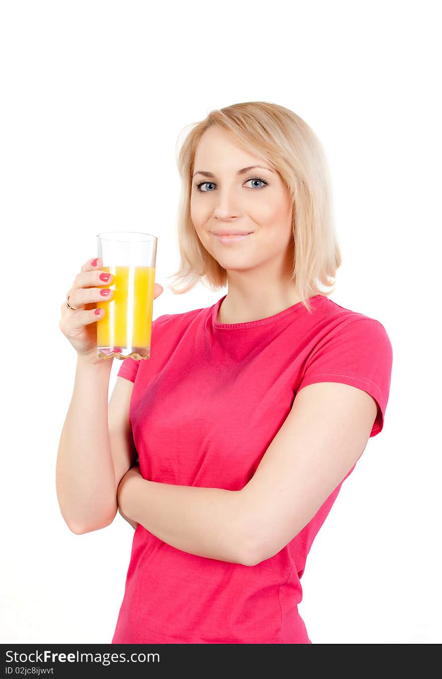 Pretty young woman with a glass of orange juice. Pretty young woman with a glass of orange juice