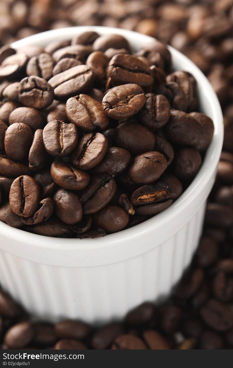 Close up of coffee beans, with shallow depth of field