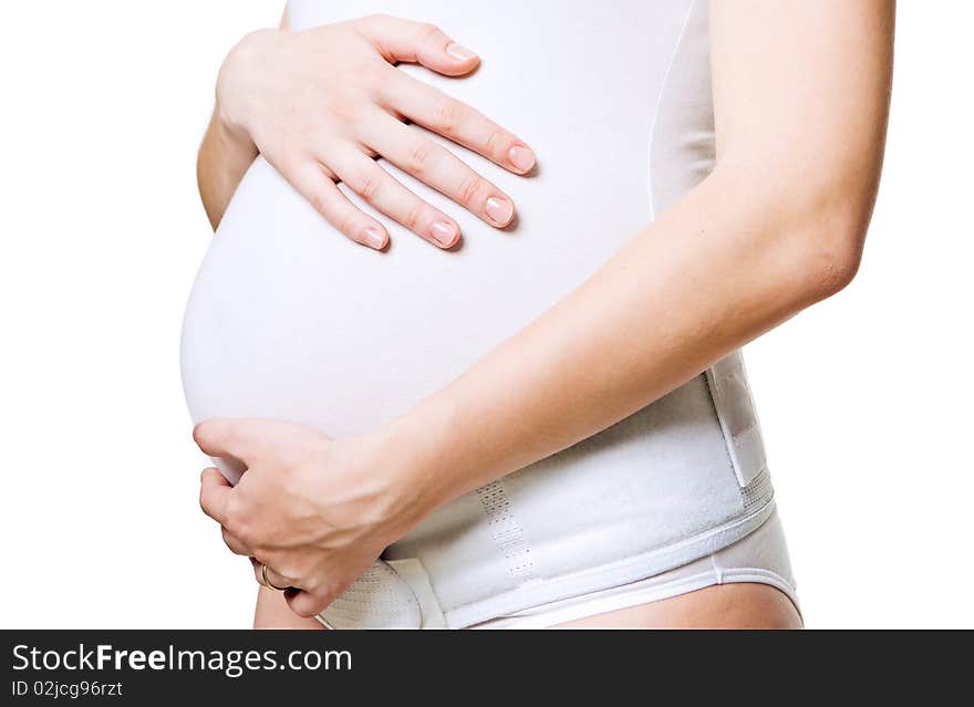 Closeup of a young pregnant woman with corset