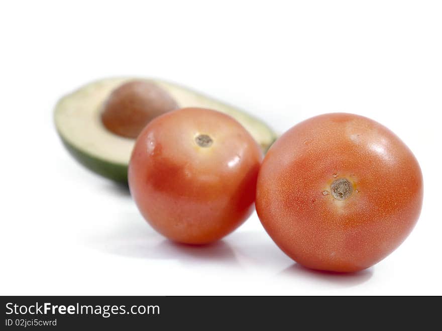 Fresh Tomato and Avocado in white background